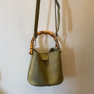 Elegant Green Leather Bag with Bamboo Handle
